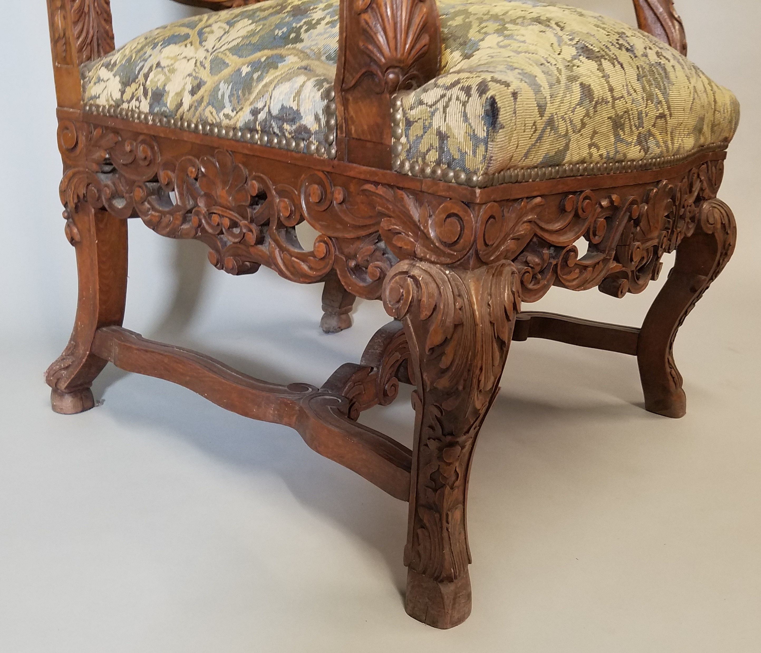 A Pair of Louis XV Style Carved wood arm chairs